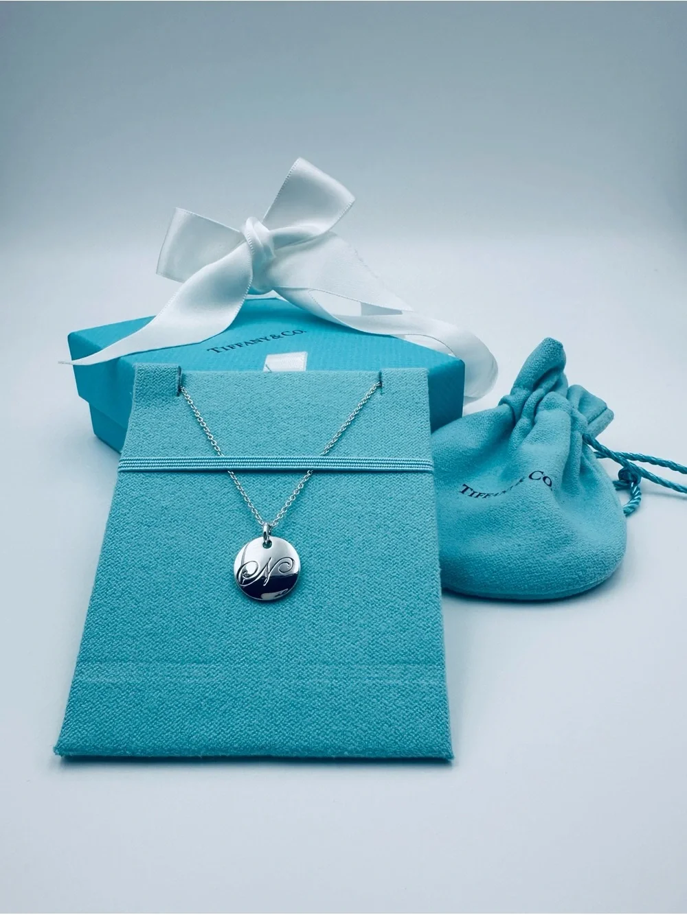 Tiffany & Co. Retired Notes Letter N Disc Charm Necklace 16” in Silver Packaging